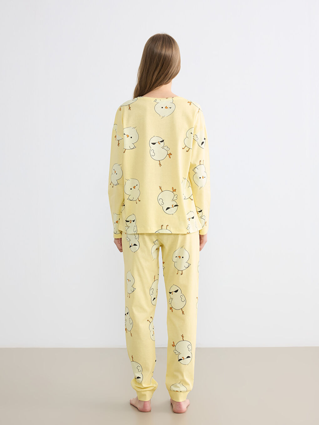 Women's patterned pajama set with a crew neck.-3