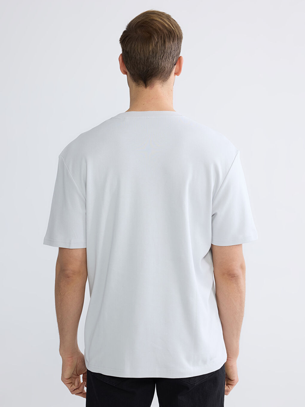 Effortless style meets ultimate comfort in our relaxed-fit, crew-neck tee for men.-3
