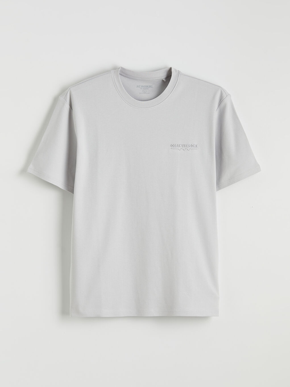 Effortless style meets ultimate comfort in our relaxed-fit, crew-neck tee for men.-4