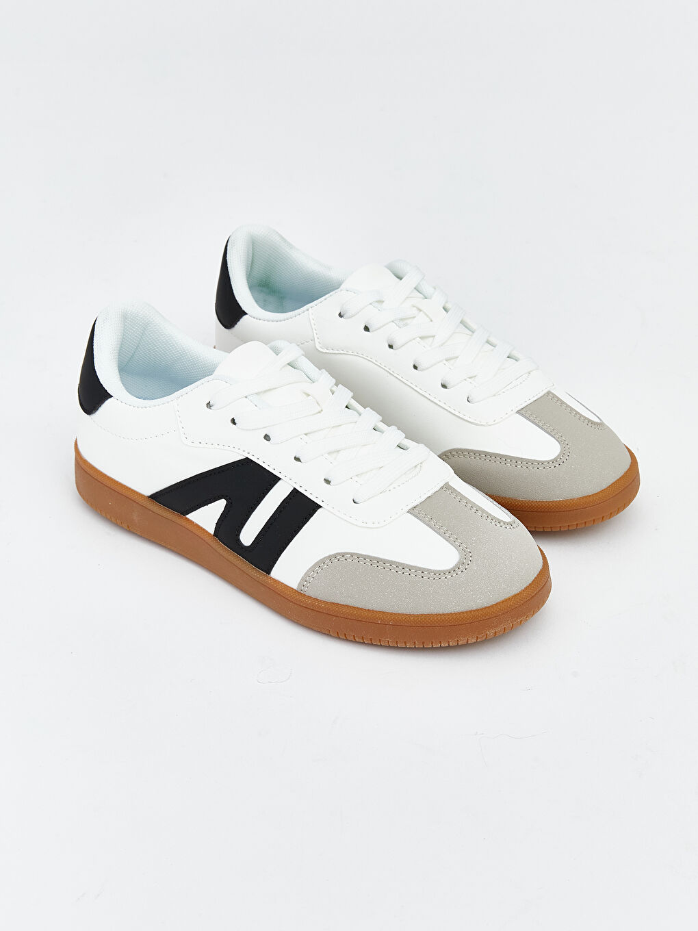 Женские кроссовки с леопардовым принтом