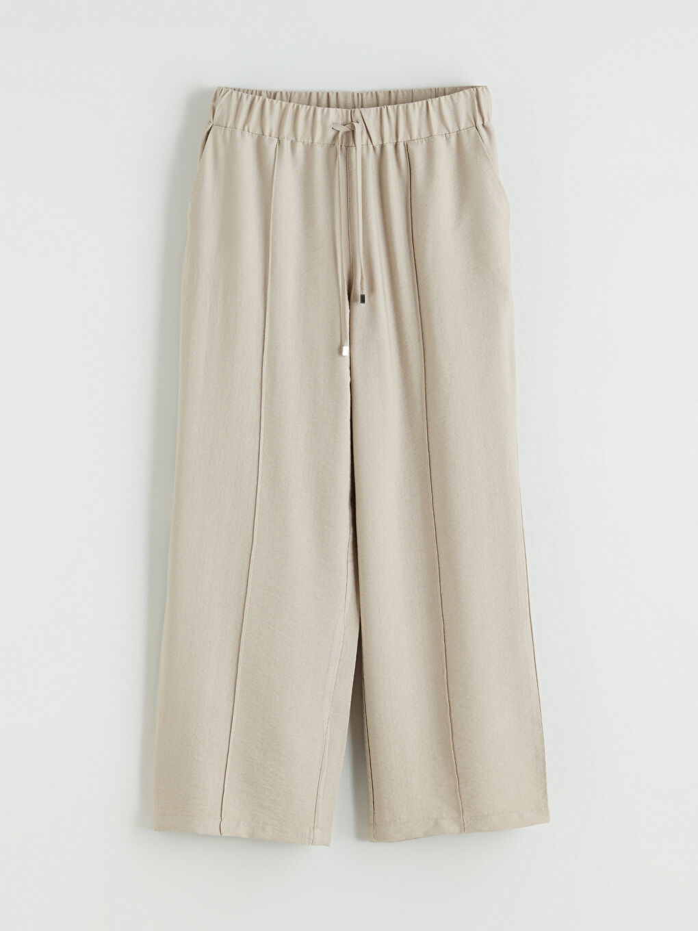 Effortless elegance meets everyday comfort in our wide-leg trousers with an elasticated waist.-4