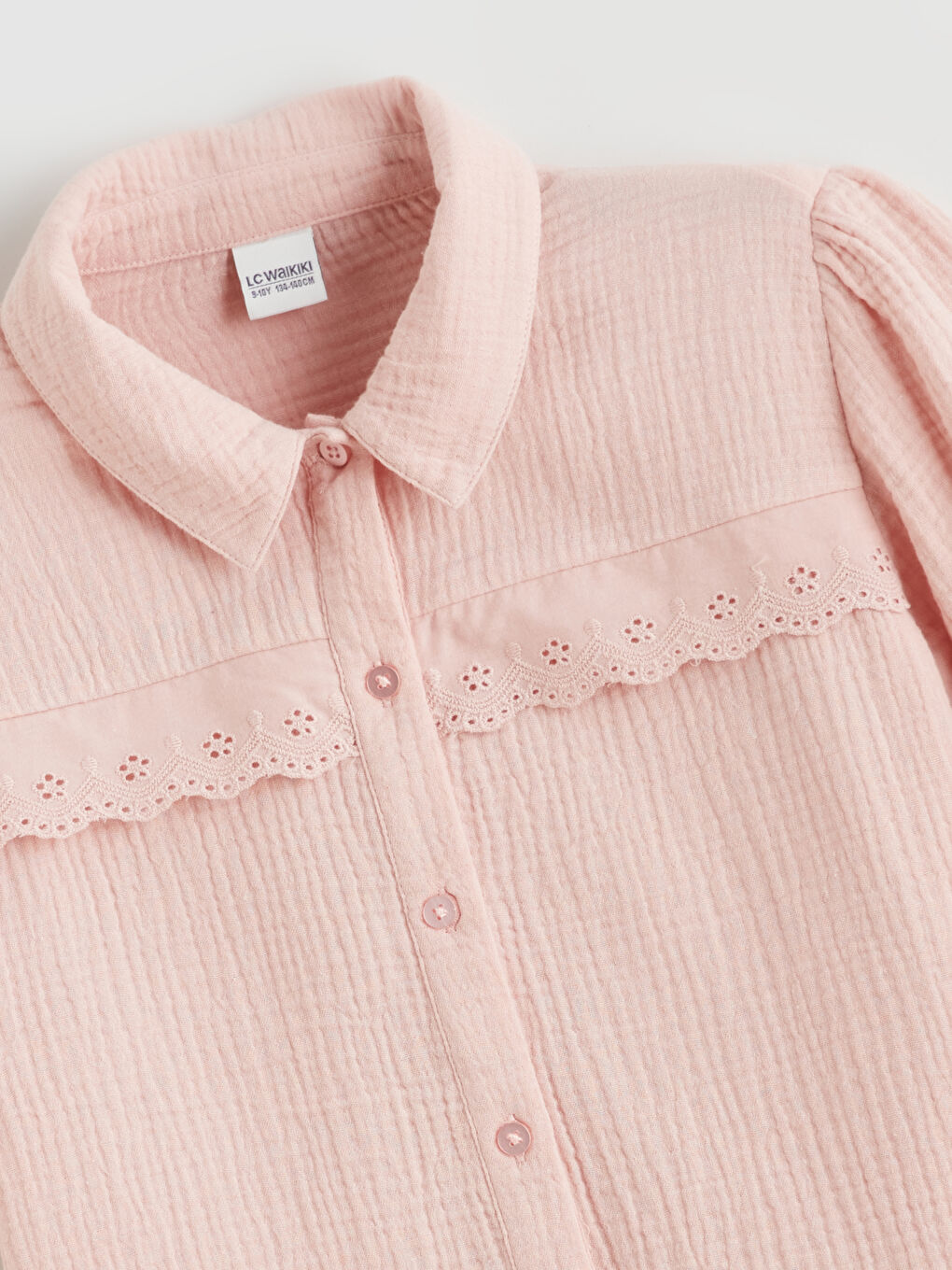 Girls' muslin shirt with eyelet detailing.-1