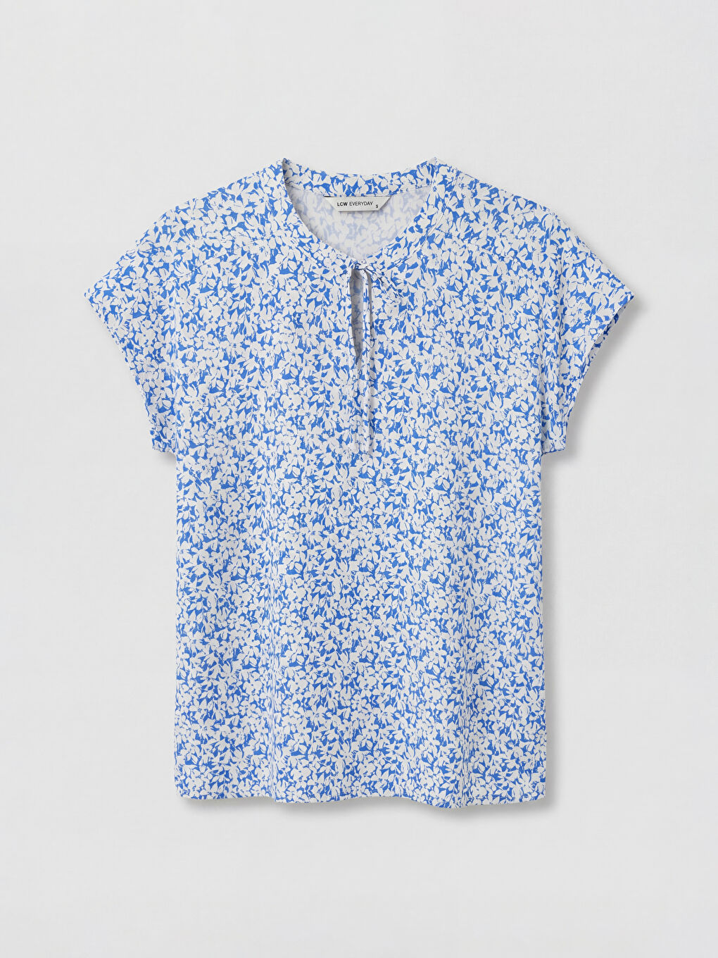 بلوزة نسائية بأكمام قصيرة مزهرة بياقة مربوطة