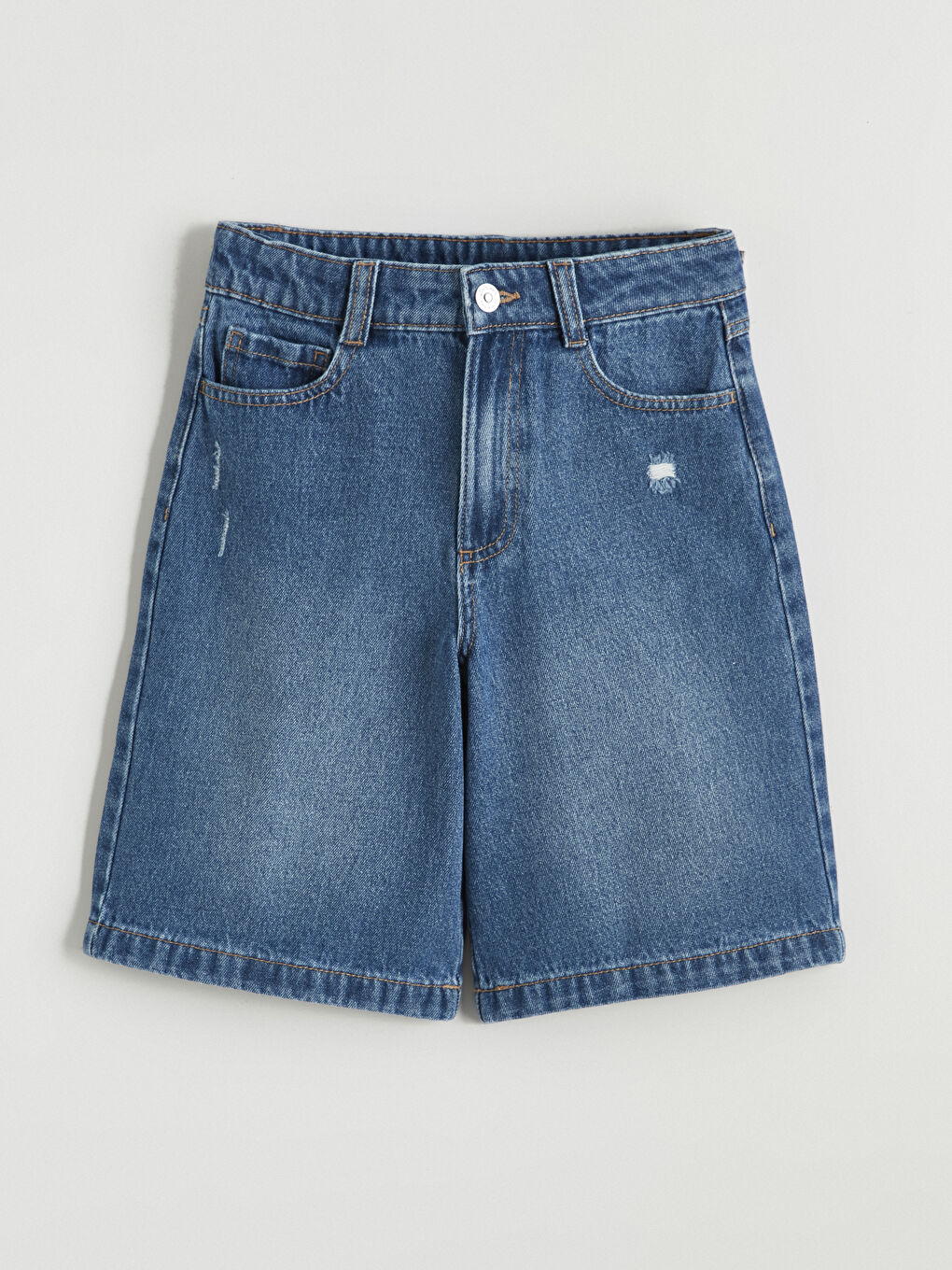 شورت جينز نيلي فتاة