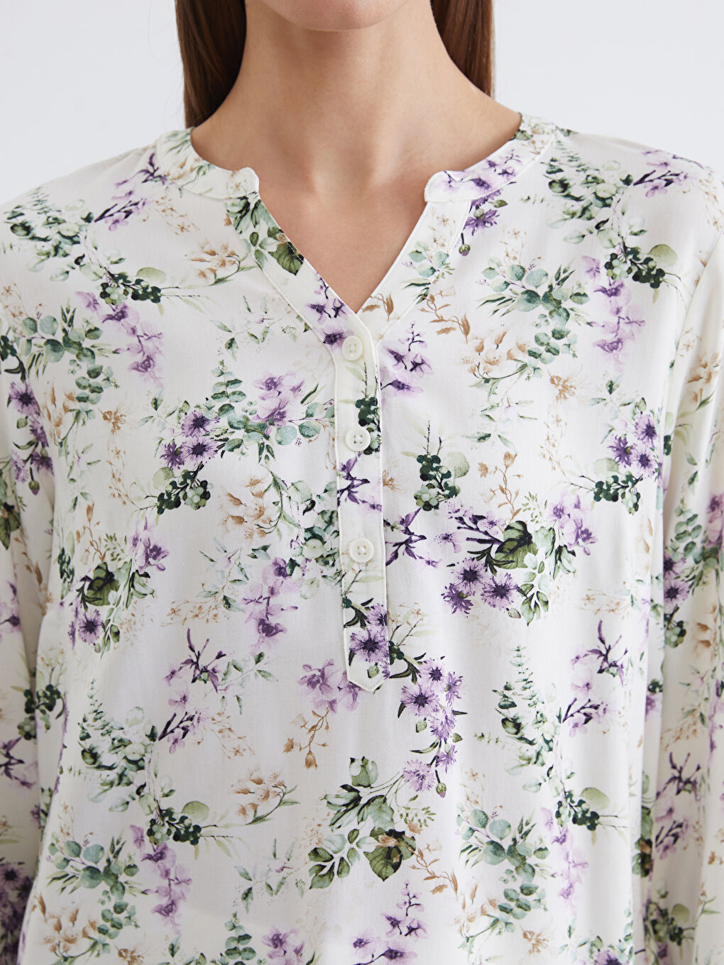 Floral blouse with an asymmetrical neckline.-2