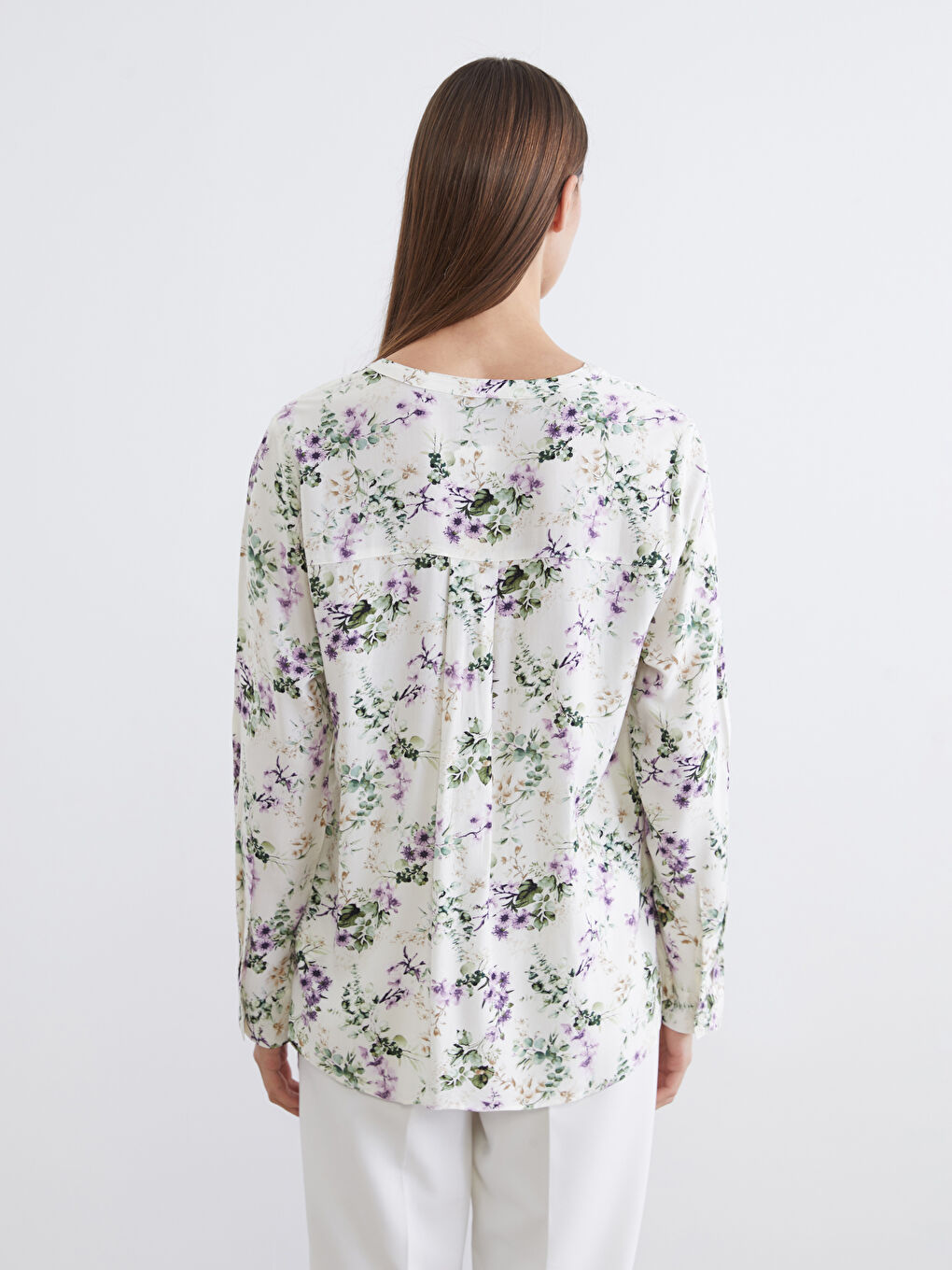 Floral blouse with an asymmetrical neckline.-3