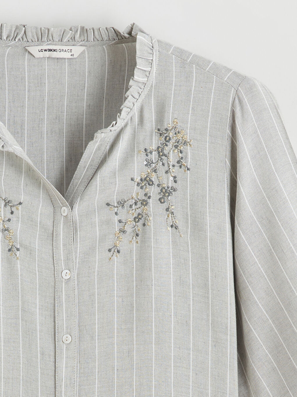 The Asymmetric Neck Striped Linen-Blend Blouse-5