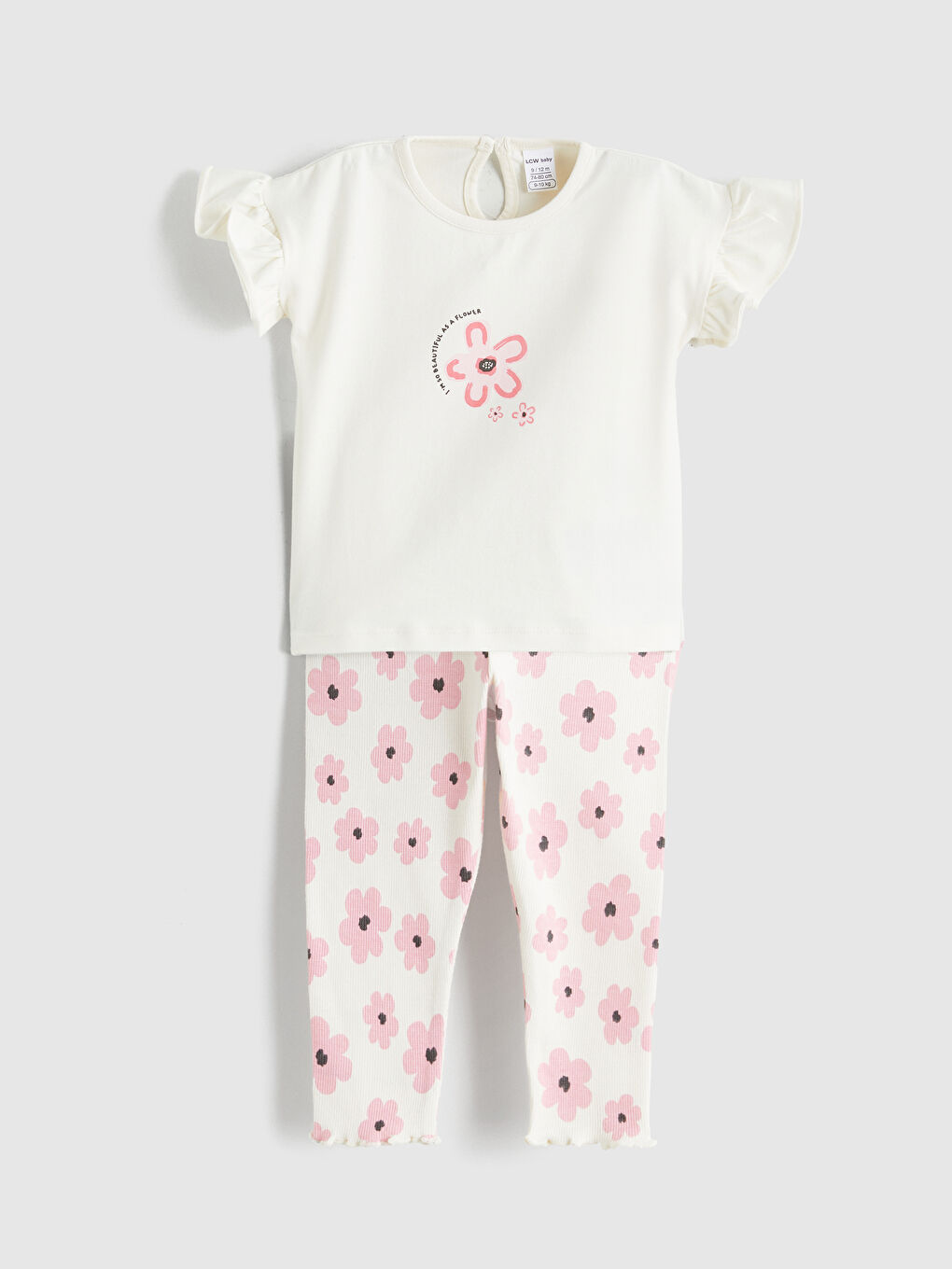 Квіткова блузка та легінси для дівчинки