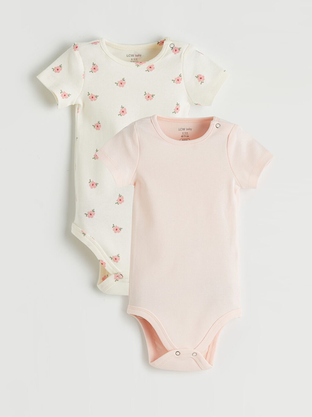 بدلة جسم بنات مواليد مزهرة بسناپ 2 باك