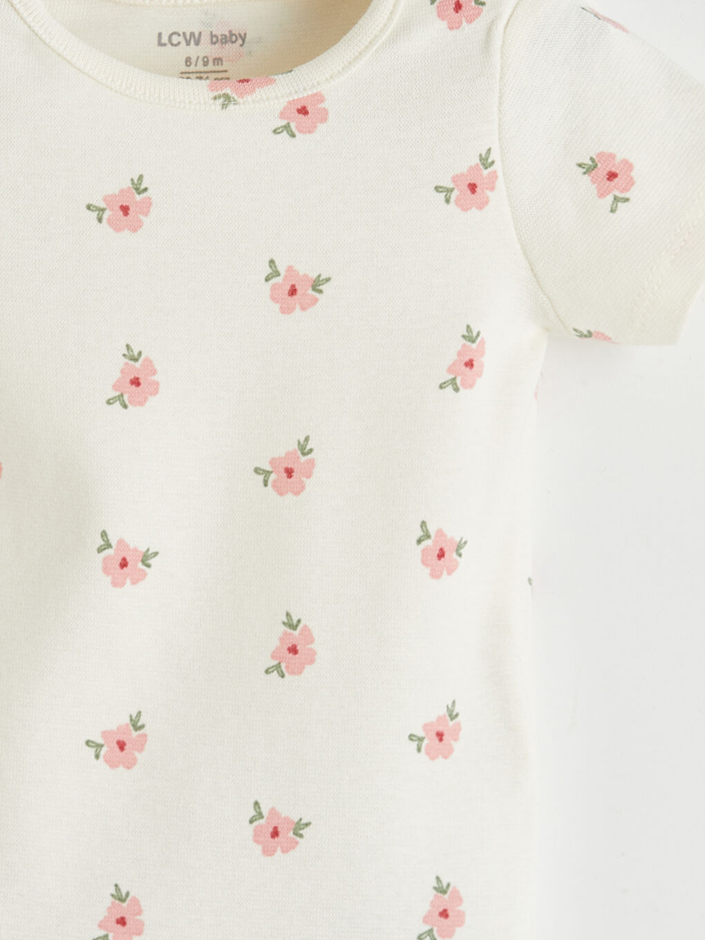 بدلة جسم بنات مواليد مزهرة بسناپ 2 باك-6