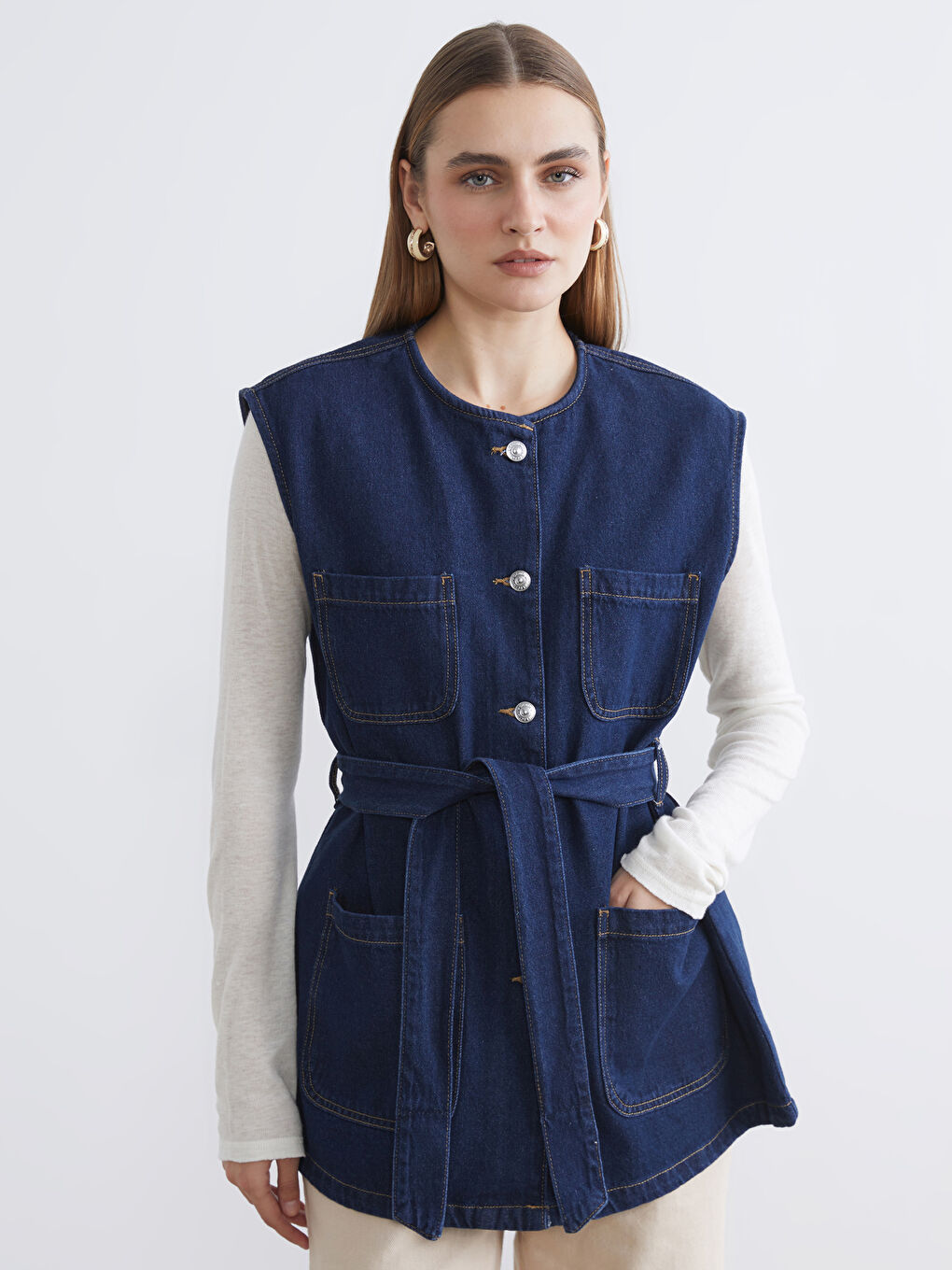 Women's crew neck denim vest.