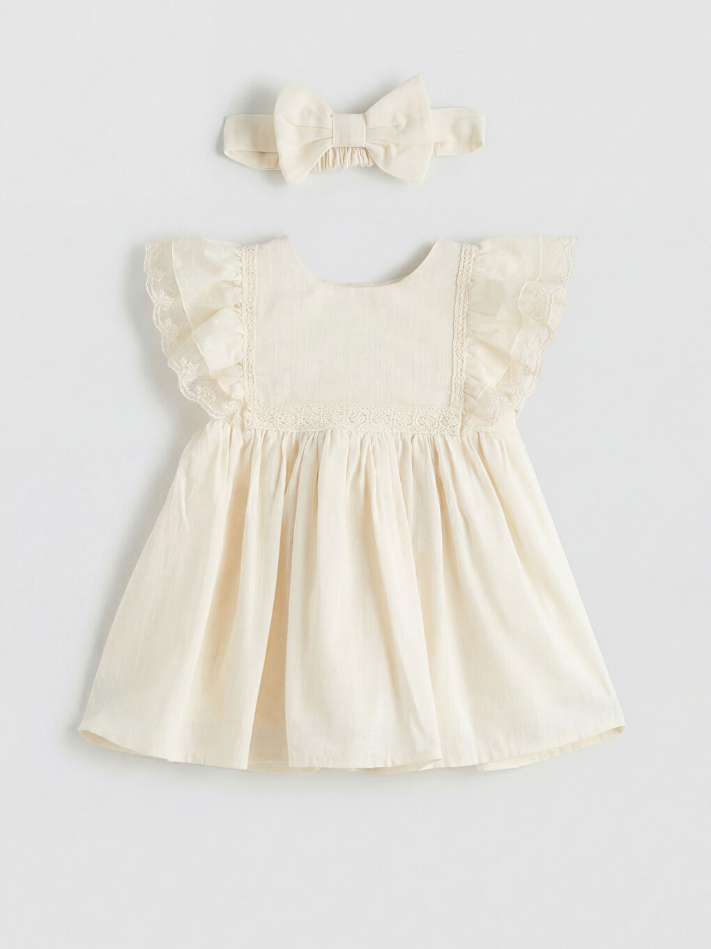 Bej Fırfırlı ve Saç Bantlı Kız Bebek Elbise