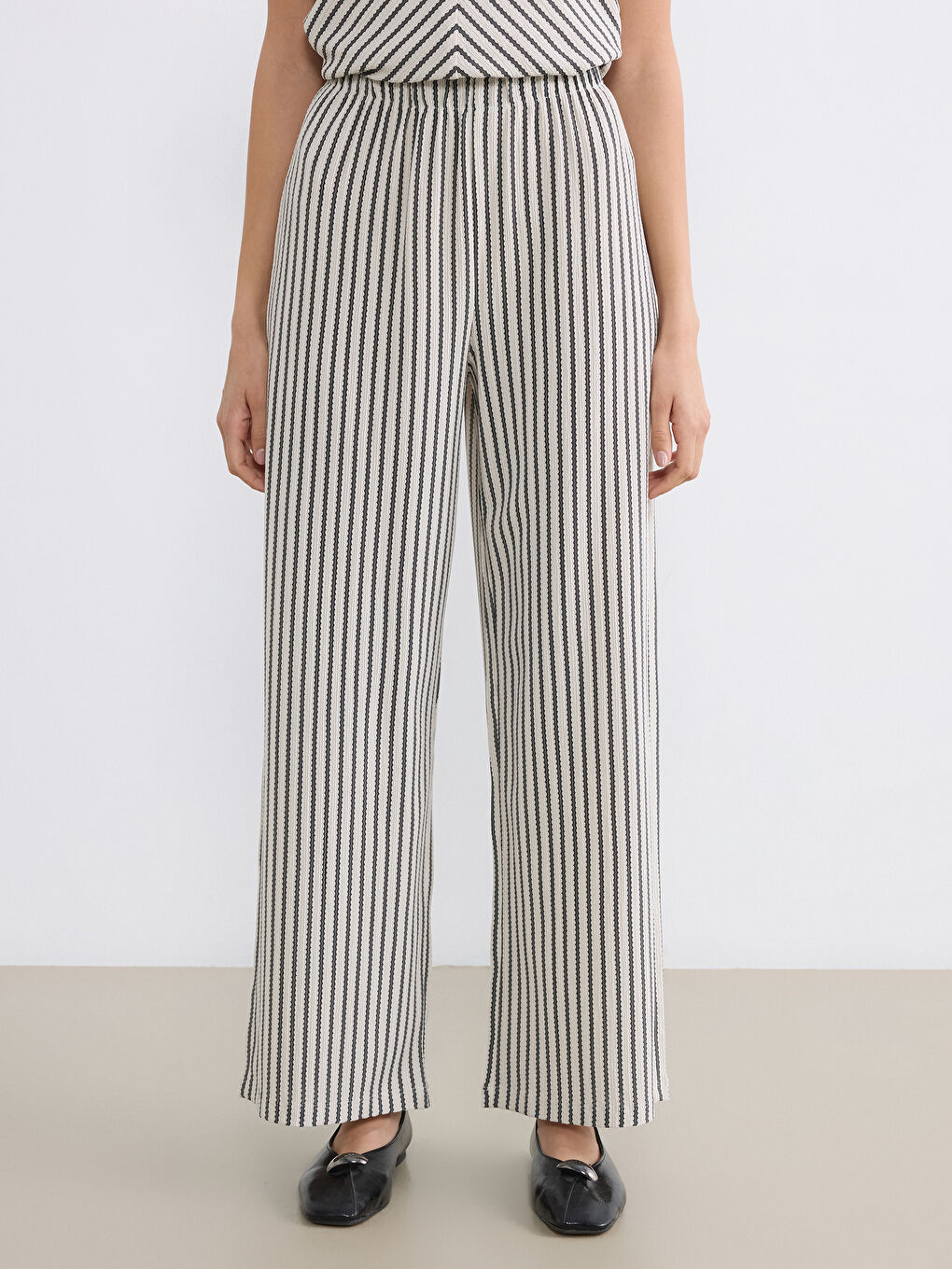 Еластични раирани дамски панталони-1