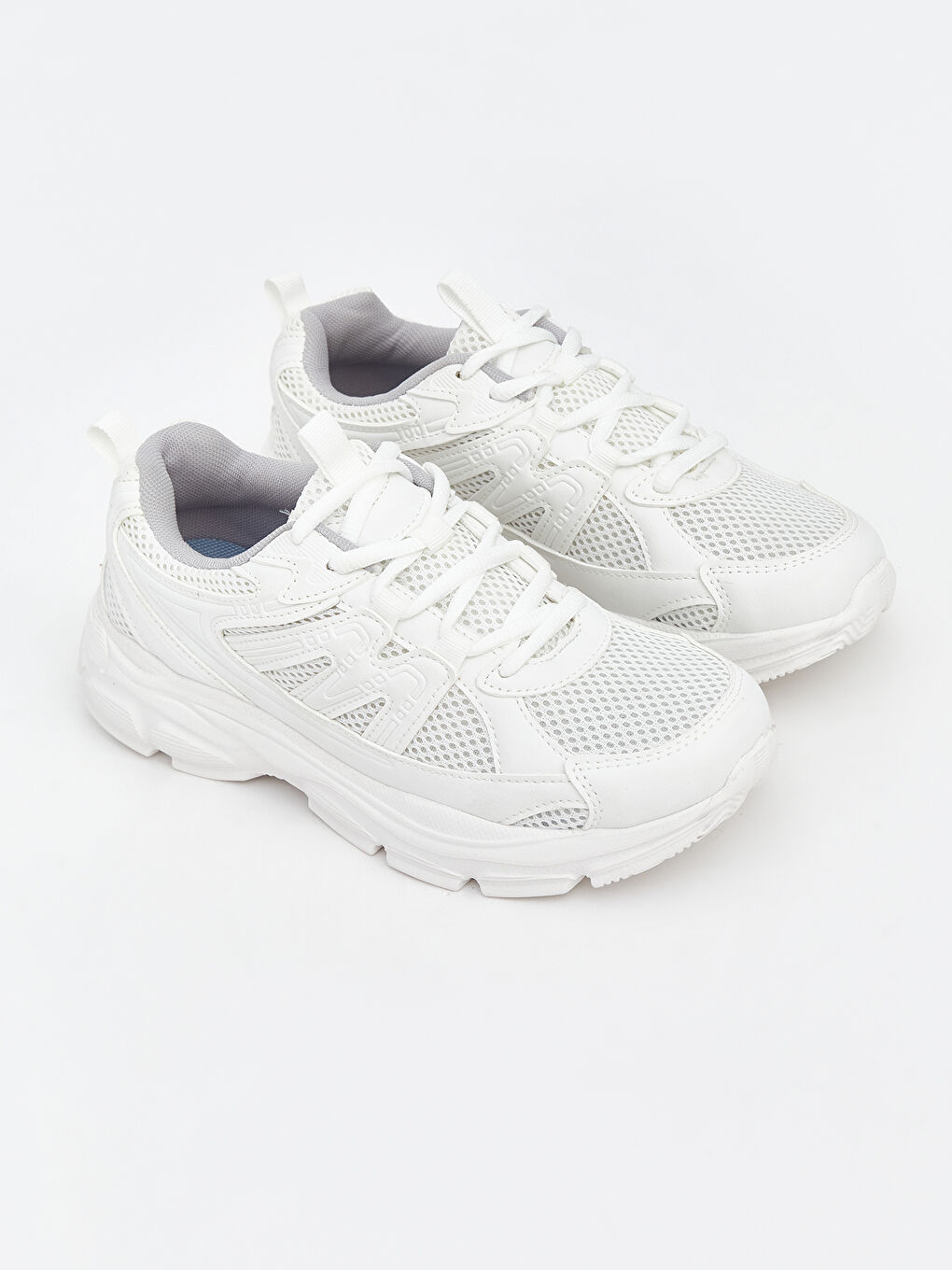 أحذية رياضية أبيض امرأة