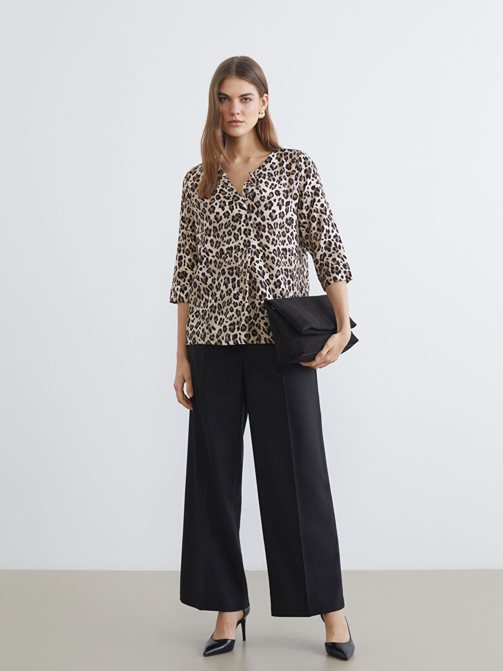 Bluza sa leopard printom i asimetričnim izrezom-1