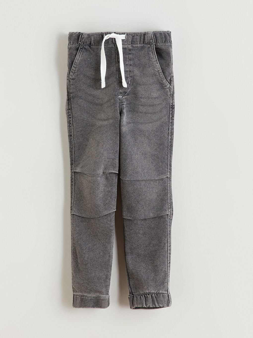 جينز رمادي ولد