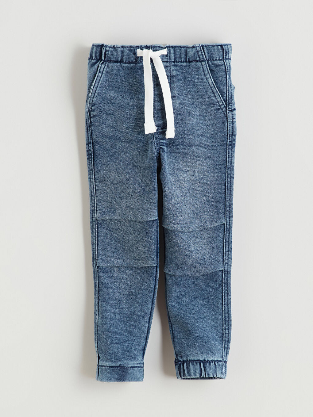 جينز أزرق ولد