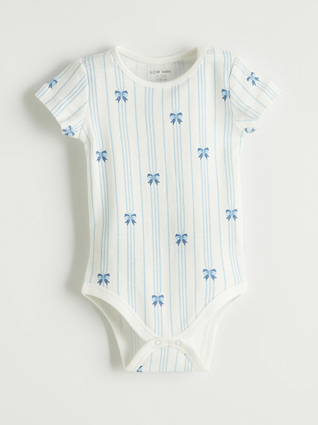 Two-piece baby girl printed snap-closure bodysuit set.-1