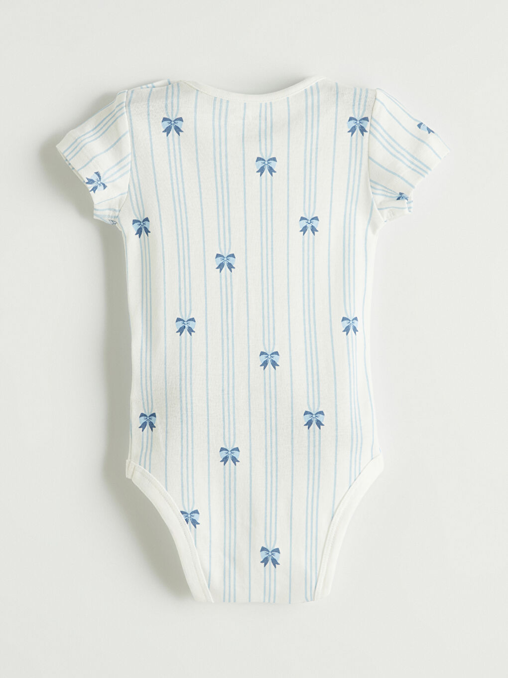 Two-piece baby girl printed snap-closure bodysuit set.-3