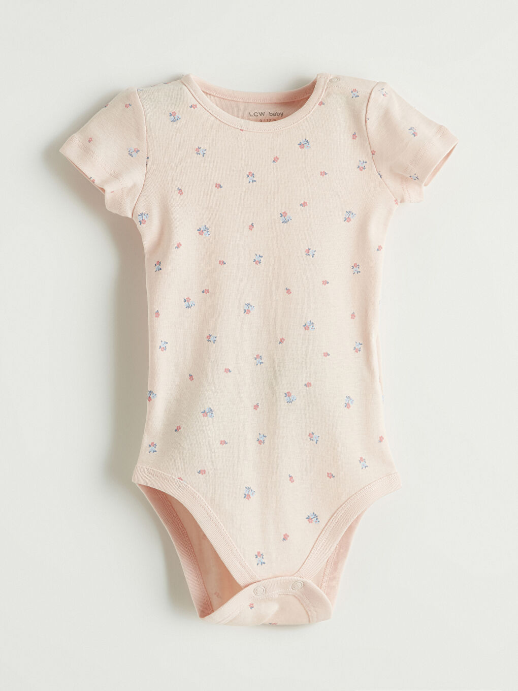 Two-piece baby girl printed snap-closure bodysuit set.-4