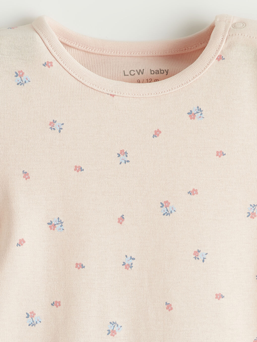 Two-piece baby girl printed snap-closure bodysuit set.-5