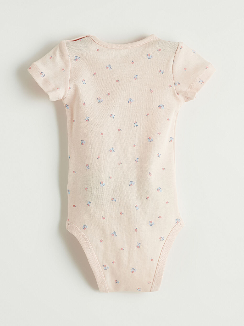 Two-piece baby girl printed snap-closure bodysuit set.-6