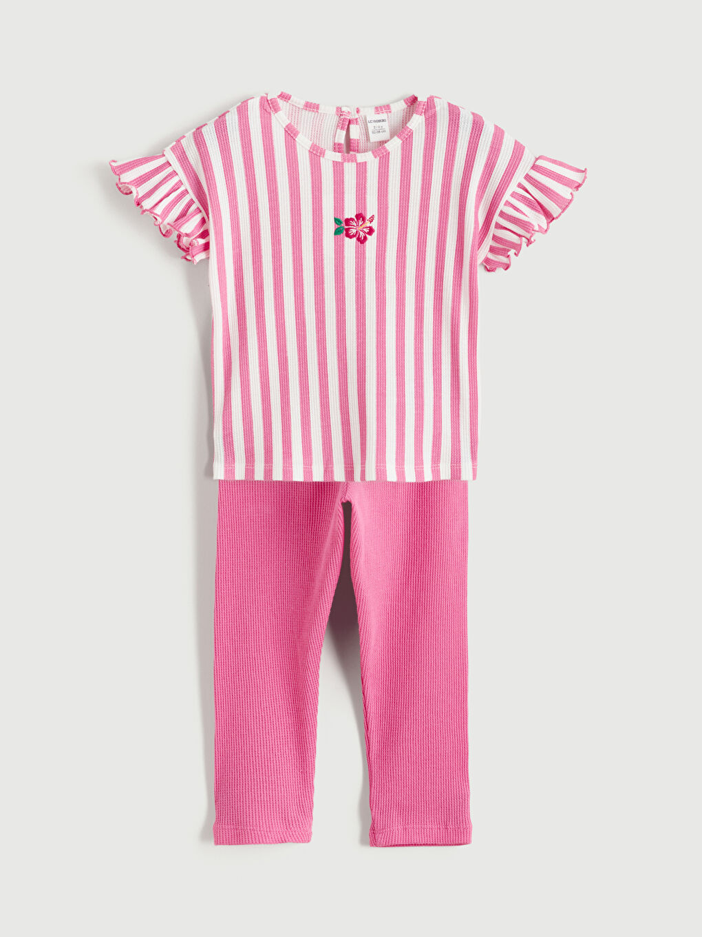 Vezeni majica sa okruglim izrezom i komplet helanki za devojčice.