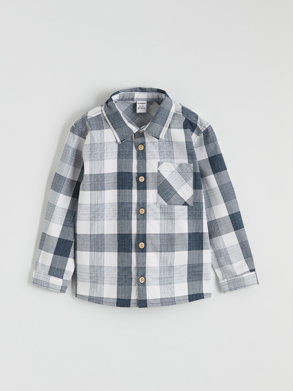 قميص أزرق ولد