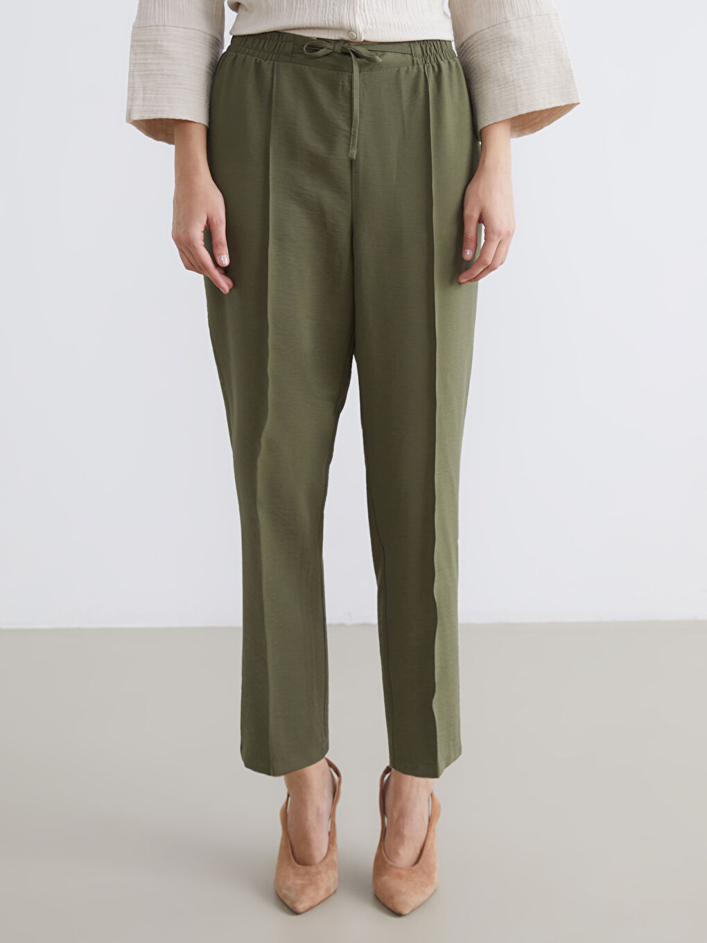 TAMNO ŽUTA Pantalone Žena-1