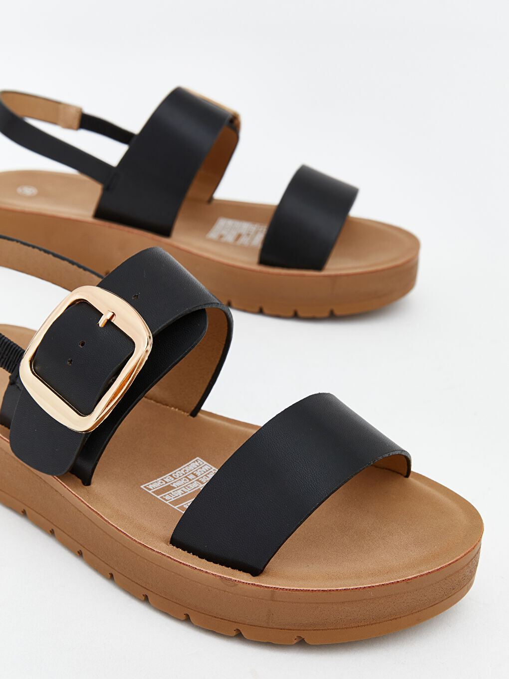 صنادل نسائية من الجلد الصناعي-2