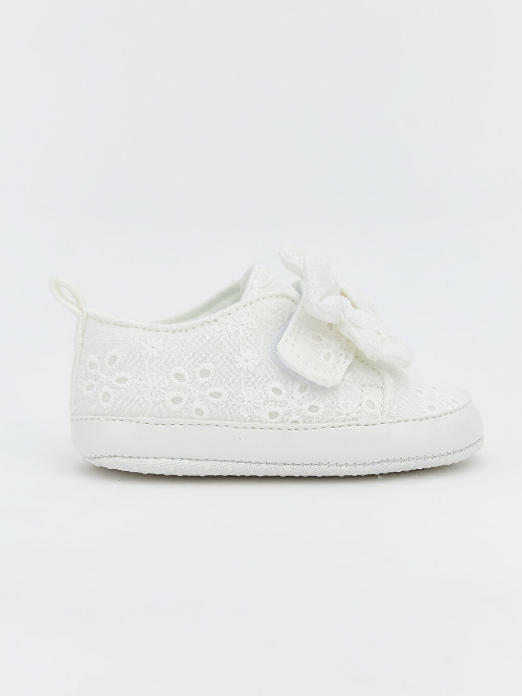 Baby girl's first walking shoes with bow detail.-1