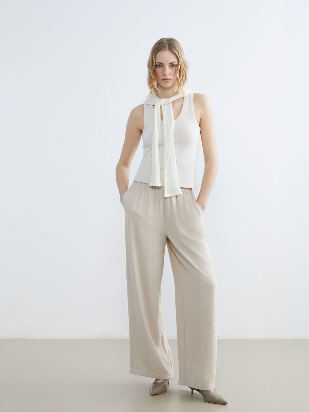 کەمەر لاستیک پانتۆڵی فراوانی ژنان