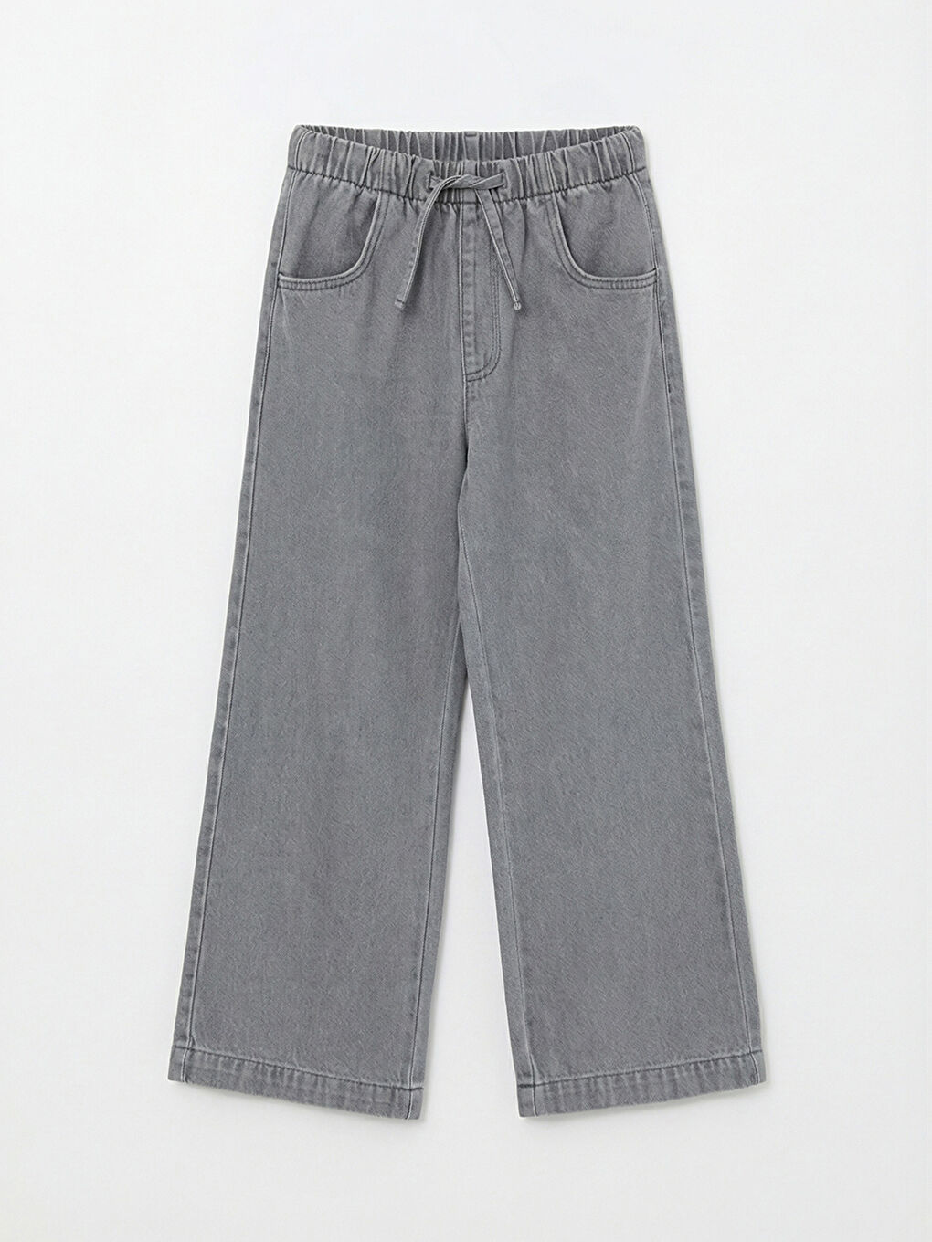 Широкі джинсові штани для дівчат