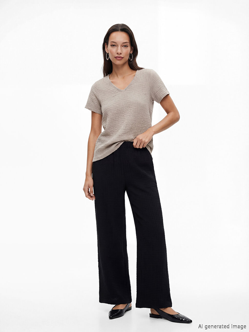 Textured wide-leg women's trousers with an elasticated waist.
