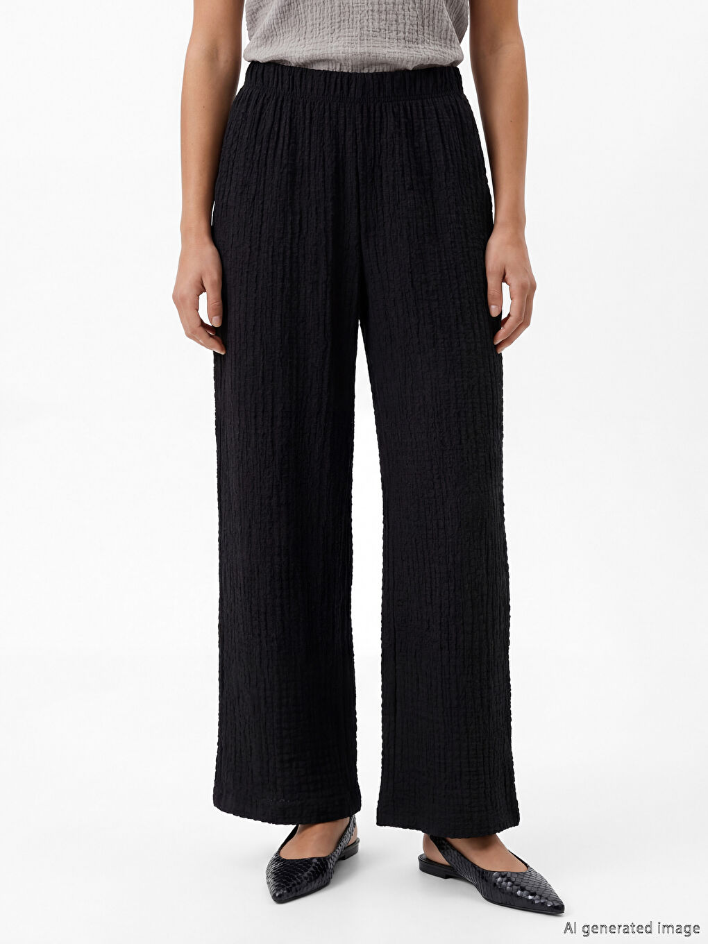 Textured wide-leg women's trousers with an elasticated waist.-1
