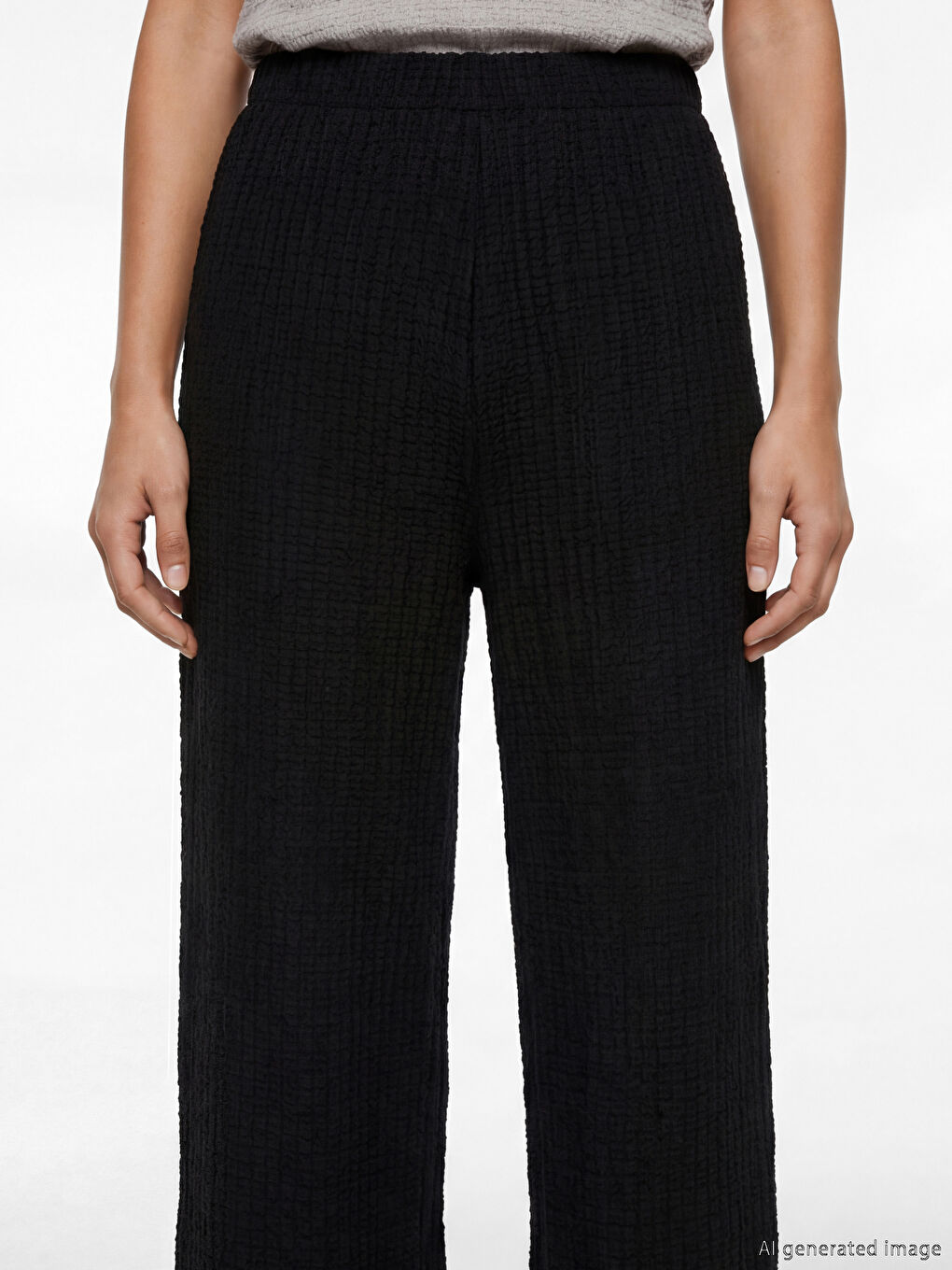 Textured wide-leg women's trousers with an elasticated waist.-2