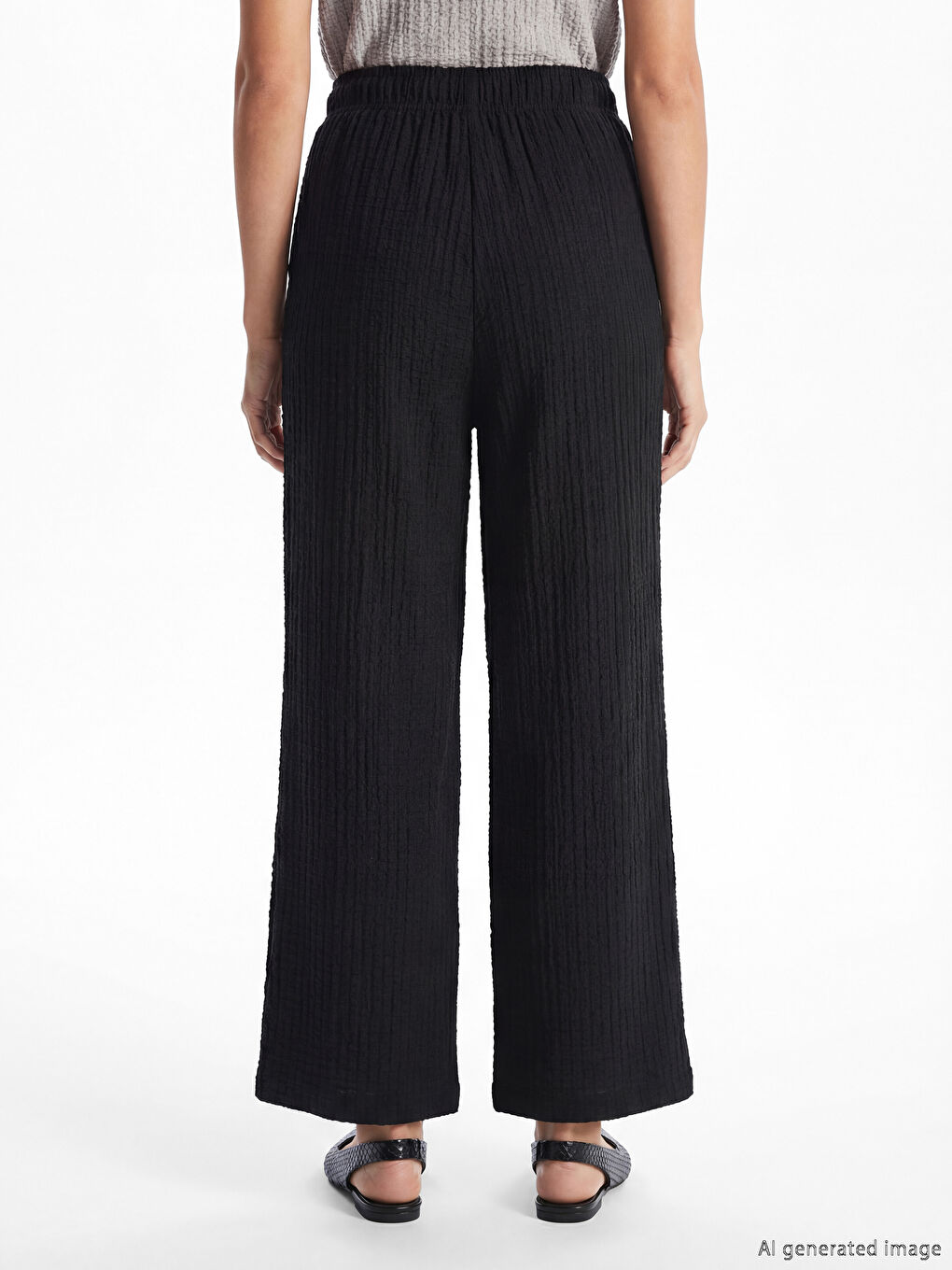 Textured wide-leg women's trousers with an elasticated waist.-3