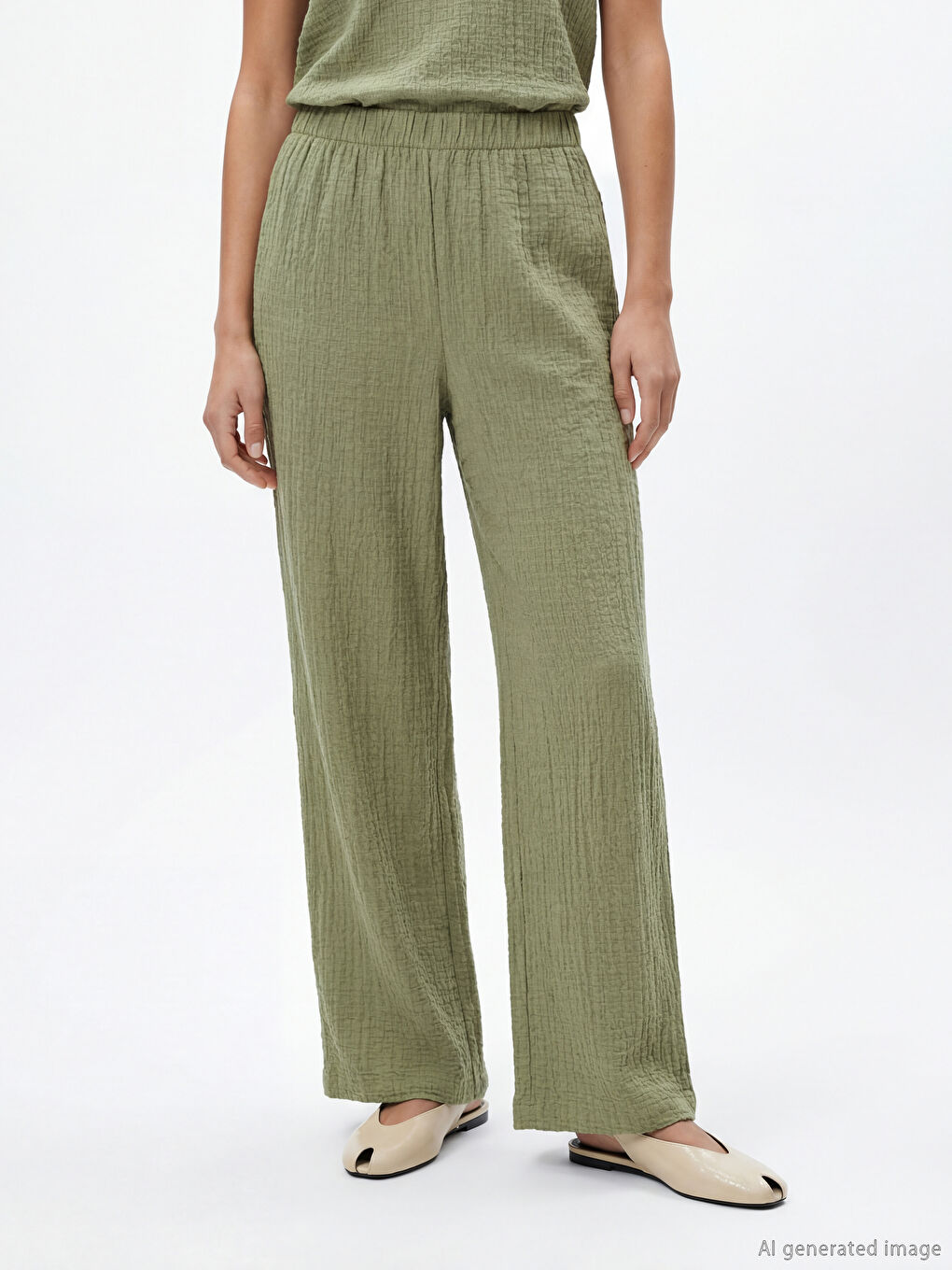 Textured wide-leg women's trousers with an elasticated waist.-1