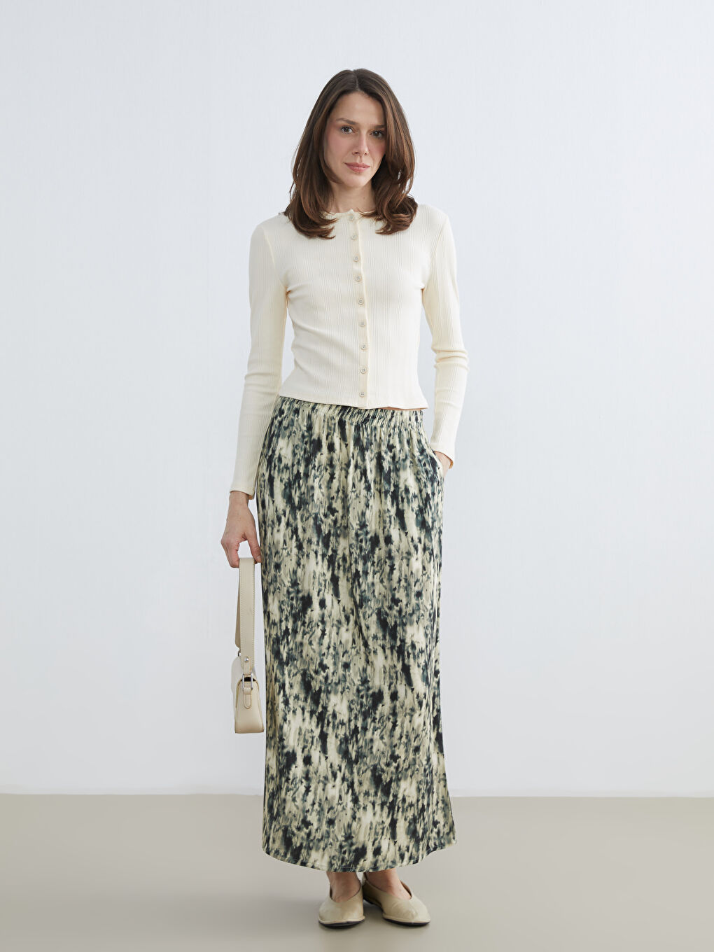 Bej Beli Lastikli Desenli Belmando Kloş Etek