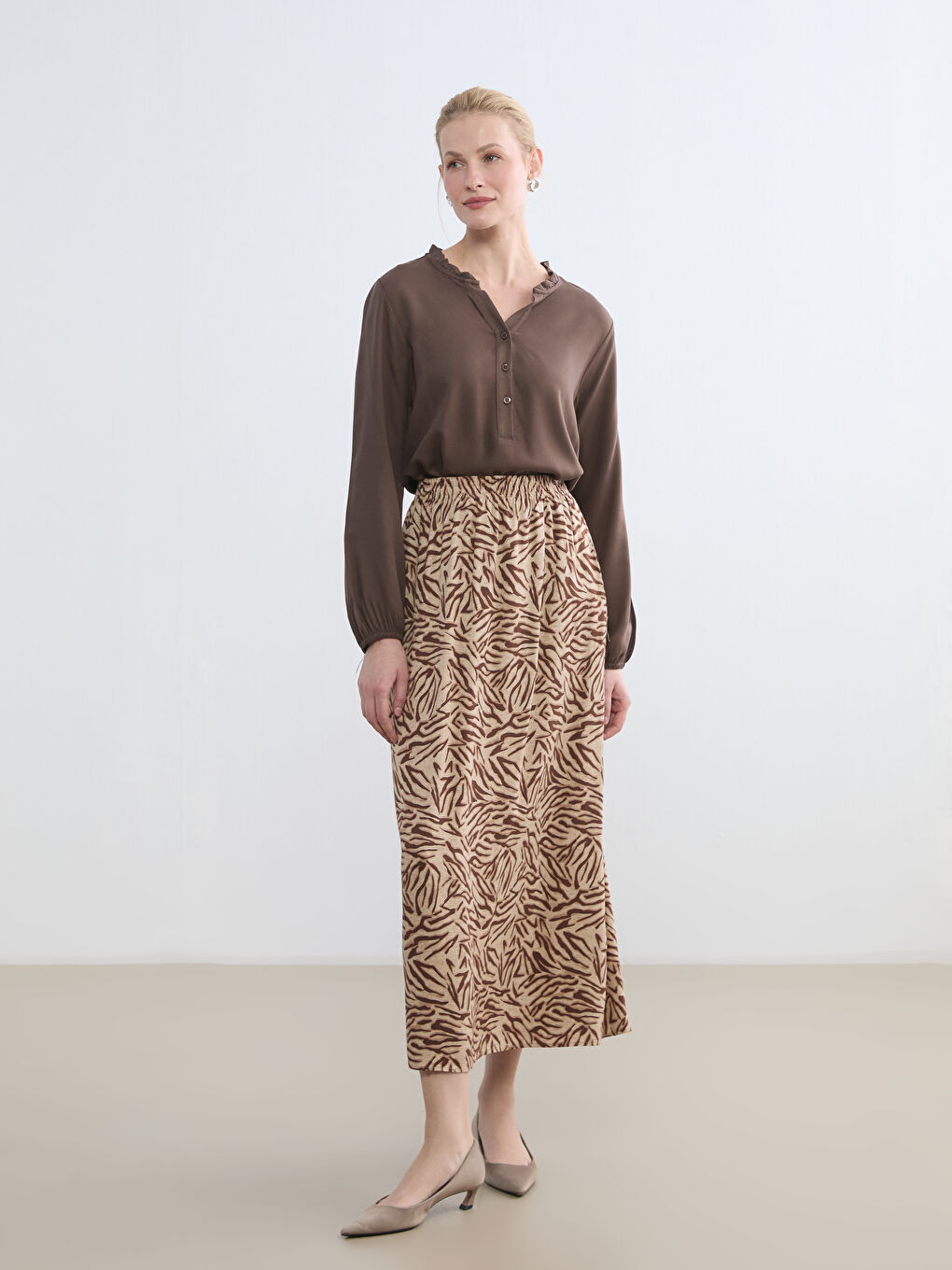 Bej Beli Lastikli Desenli Belmando Kloş Etek