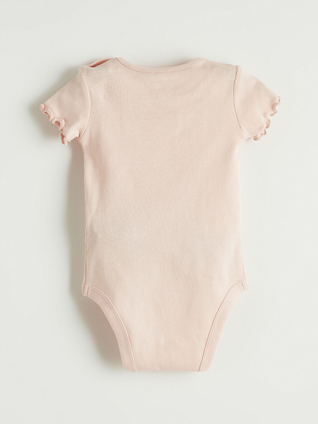 Two-piece ruffled baby girl snap-closure bodysuit.-6