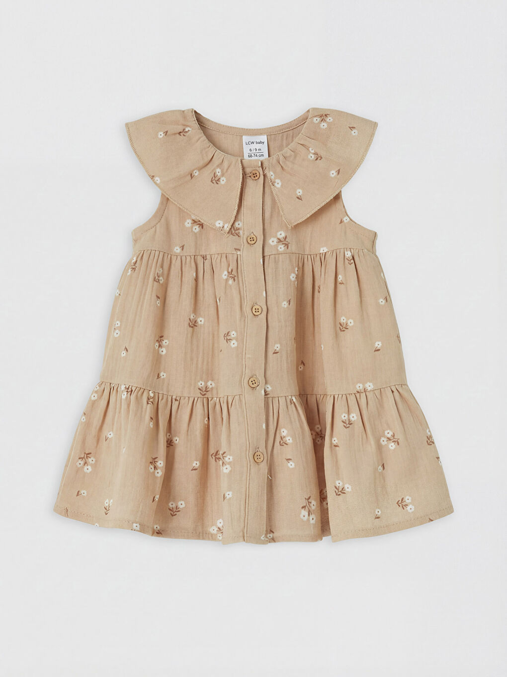 Bej Bebe Yaka Çiçek Desenli Kız Bebek Müslin Elbise