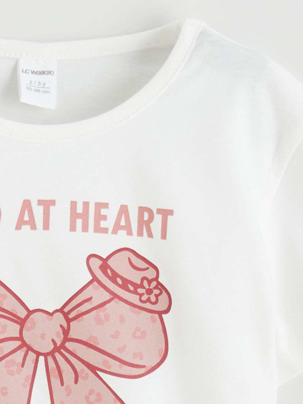 Ekru Bisiklet Yaka Fiyonk Baskılı Kız Çocuk Tişört-1