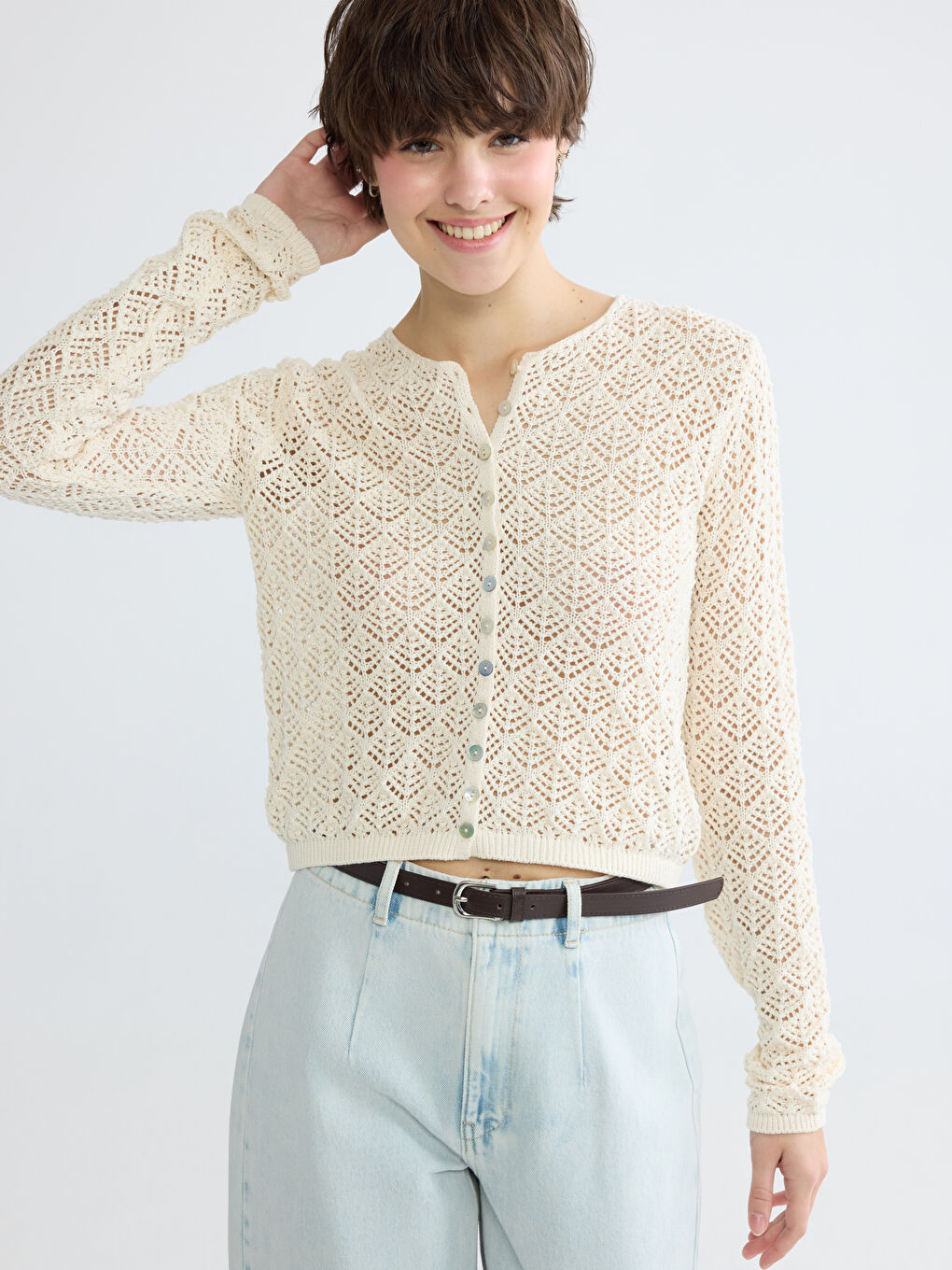 ქალი კრემისფერი კარდიგანი