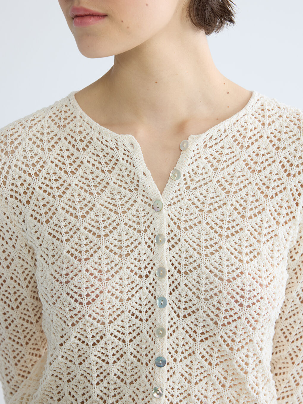 ქალი კრემისფერი კარდიგანი-2