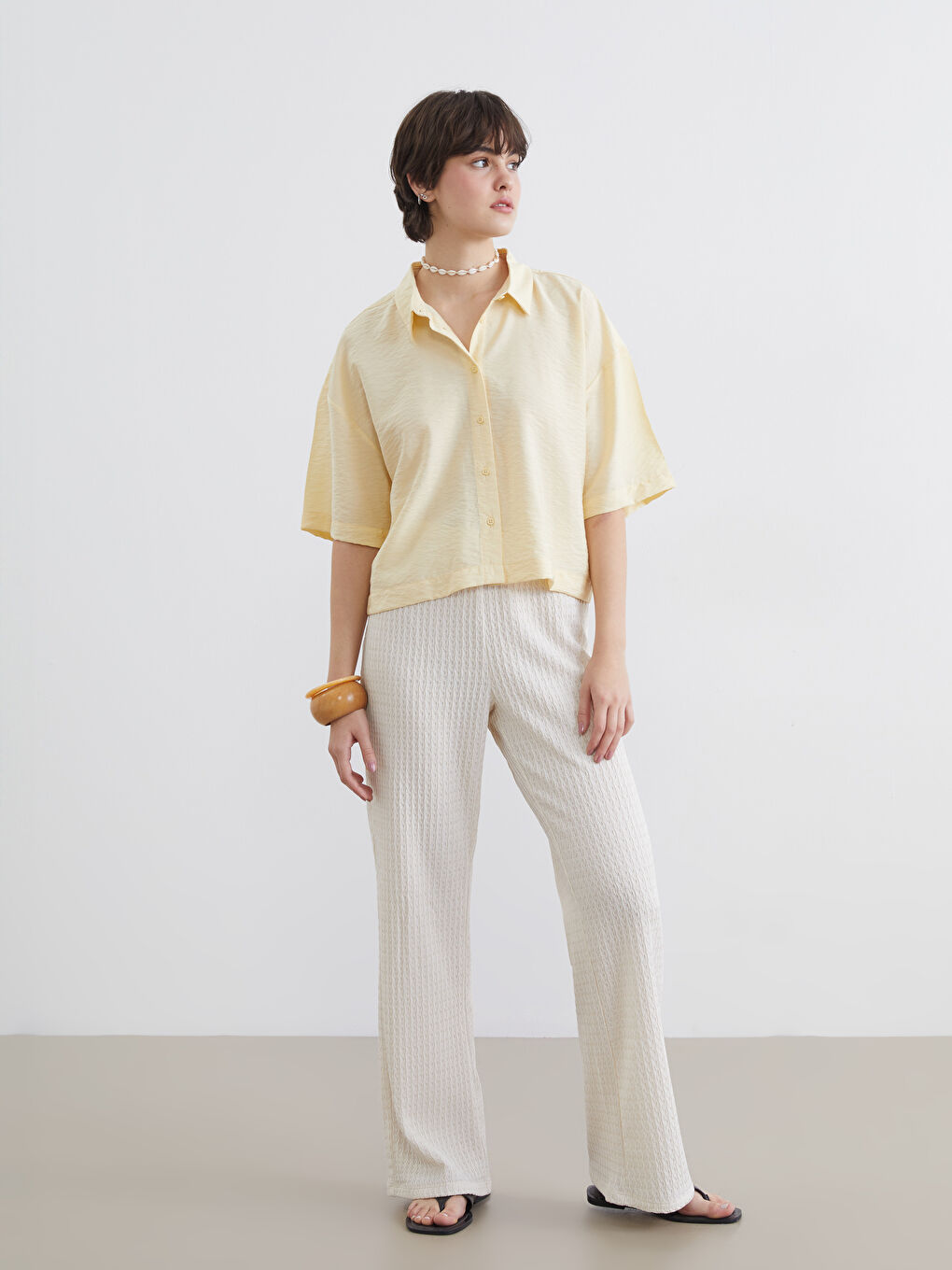 ქალი ბეჟი შარვალი