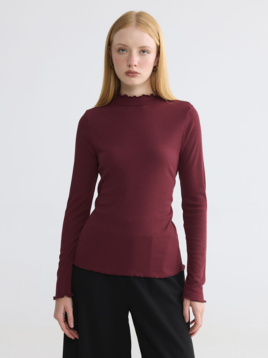 Ruffled High-Neck Bodysuit