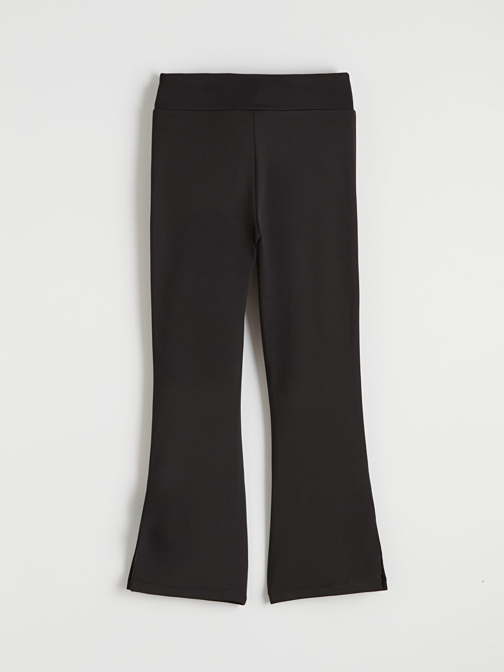 Girls' flared leggings with an elasticated waist.-1