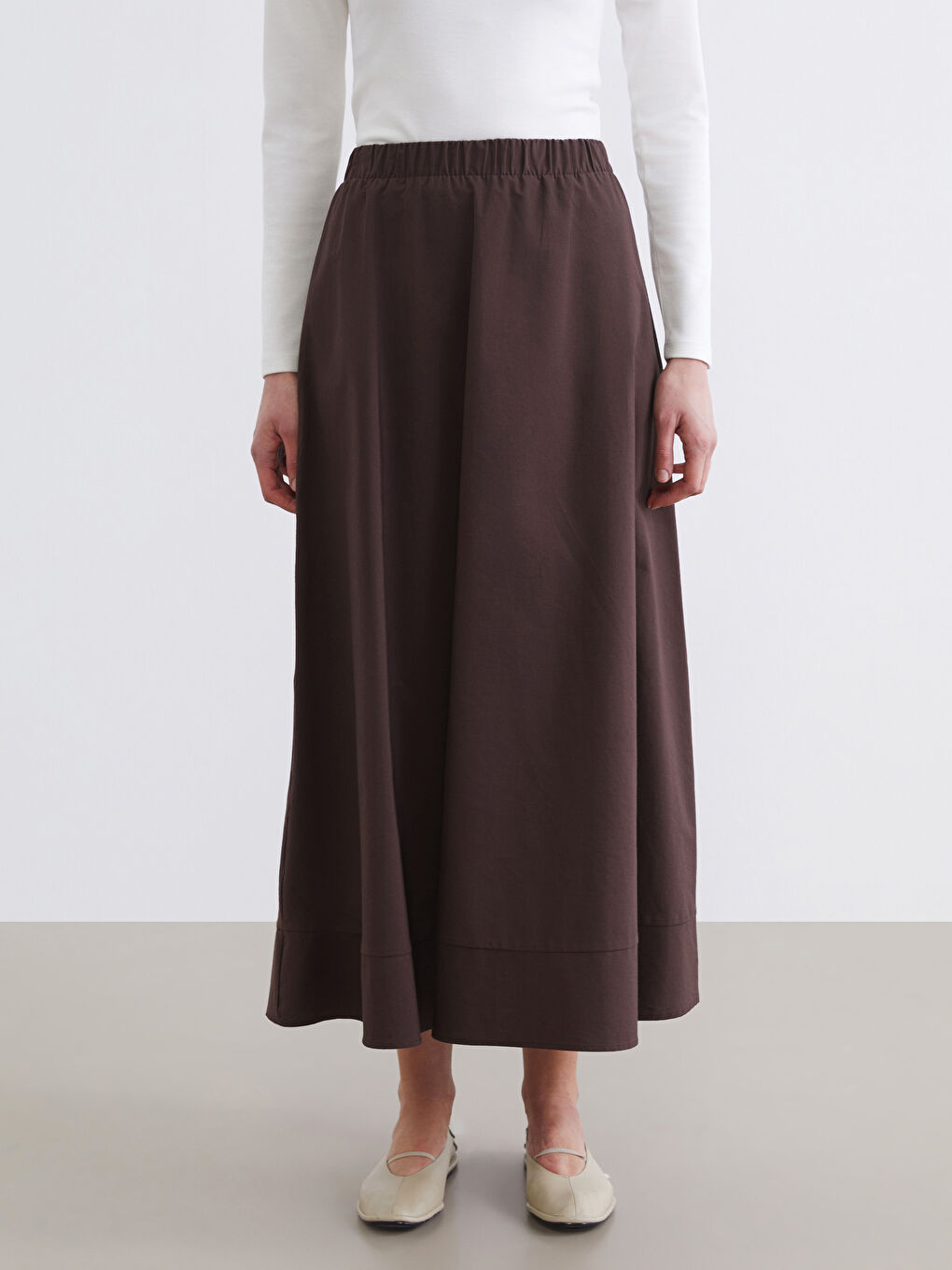 تەنورە قاوه‌یی ژن-1