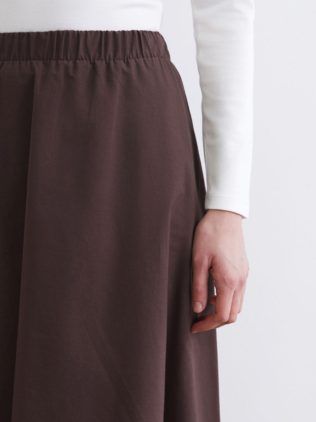 تەنورە قاوه‌یی ژن-2